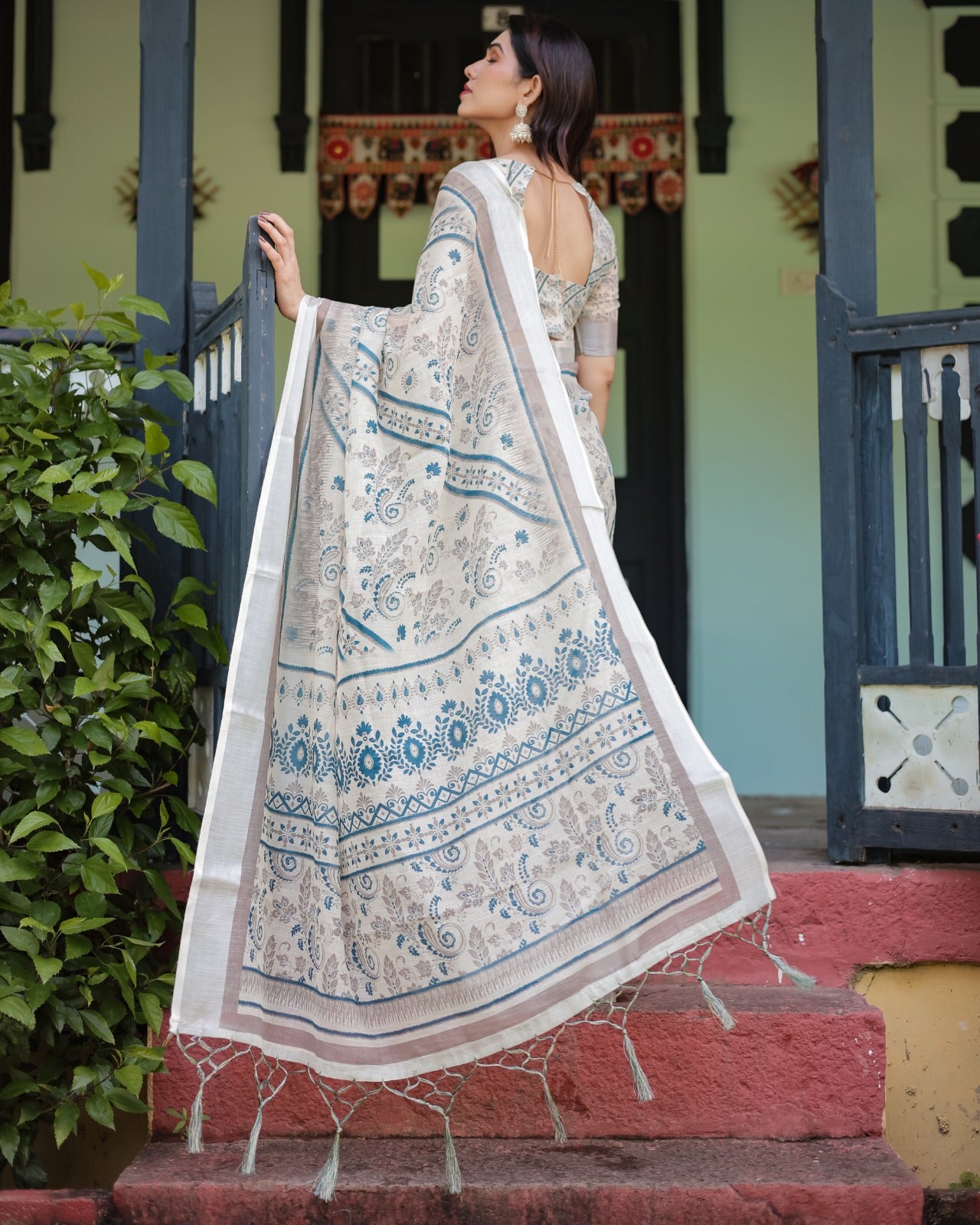 Sophisticated Off-White & Blue Linen Cotton Saree with Paisley Floral Print and Zari Border